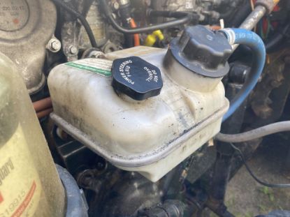 Picture of (Used) 2016 Freightliner Cascadia 125, POWER STEERING RESERVOIR,
Side: Driver aside,
Material: Plastic, 
Part Number: A14