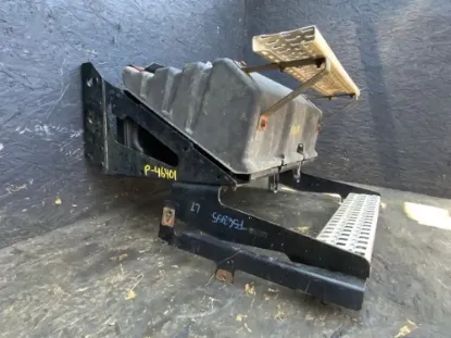 Picture of (Used) 2018 Volvo VNL, BATTERY BOX, 
Side: Driver Side,
Color: Black,
Capacity: 4 batteries,
Material: Steel with plastic cover 
Dimensions: L=30.5”, W=15”,
Reference images for condition 
 


