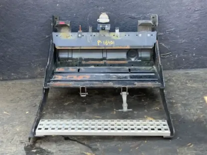 Picture of (Used) 2018 Volvo VNL, BATTERY BOX, 
Side: Driver Side,
Color: Black,
Capacity: 4 batteries,
Material: Steel with plastic cover 
Dimensions: L=30.5”, W=15”,
Reference images for condition 
 


