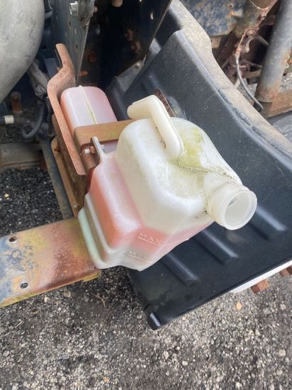 Picture of (USED) 2003 Isuzu NPR HD, COOLANT RESERVOIR,
Plastic, transparent, passenger side, less cap,
 
