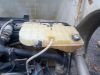 Picture of Used 2014 Peterbilt 367, COOLANT RESERVOIR, 
Make: Peterbilt,
Passenger side, plastic, transparent,white,
 
(CRG Heavy Truck Parts)
*F56174*