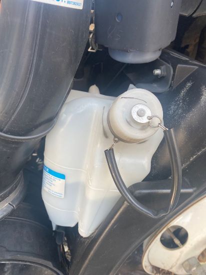 Picture of Used 2018 Isuzu NPR, Coolant Reservoir, plastic, transparent, white, passenger side, 

(CRG Heavy Truck Parts)
*F56146*
