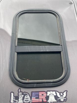 Picture of (Used) 2016 Freightliner Cascadia 125, SLEEPER WINDOW,
Side: Passenger Side Bottom,
Shape: Rectangular,
Color: Black,
Material: Glass,
Type: Vent,
 
