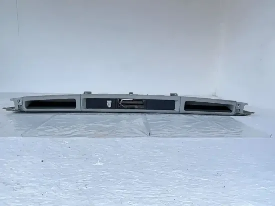 Picture of (Used) 2015 Kenworth T680,  OVERHEAD STORAGE COMPARTMENT,
Material: Plastic,
Color: Grey,
Reference images for condition.
 

,
