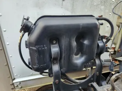 Picture of (Used) 2000 Mitsubishi FH211, COOLANT RESERVOIR/RADIATOR OVERFLOW BOTTLE