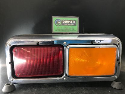 Picture of Used 1999 Pierce Low Floor Bus, marker/parking lamp assembly, driver side, plastic lens, red lamp and orange lamp,
Part No: 61