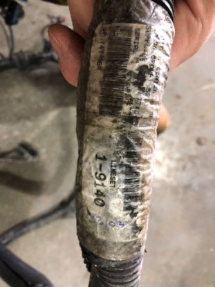 Picture of Black Plug From Firewall Down