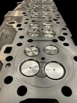 Picture of Brand New Caterpillar 3406E LOADED Universal Stage 4 Cylinder Head.

This head will work with both Acert and non
