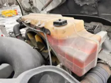 Picture of (Used) 2009 Volvo VHD, RADIATOR OVERFLOW BOTTLE/COOLANT RESERVOIR