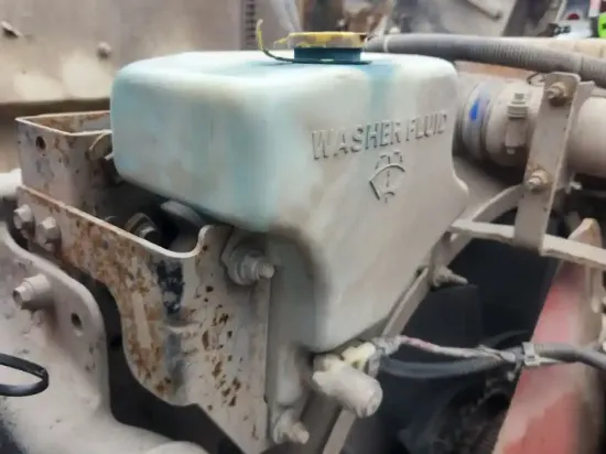 Picture of (Used) 2018 Peterbilt 567, WINDSHIELD WASHER RESERVOIR