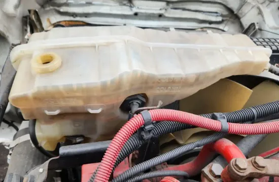 Picture of (Used) 2013 Freightliner Cascadia 125, RADIATOR OVERFLOW BOTTLE/COOLANT RESERVOIR