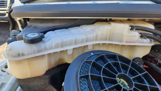 Picture of (Used) 2015 Freightliner M2 106, RADIATOR OVERFLOW BOTTLE/COOLANT RESERVOIR