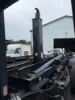 Picture of **Stellar Hydraulic Hook Lift with Pioneer RP4500 Automatic Tarp System – Complete Assembly** WITH PTO an PUMP (TRUCK HAD 8LL Manual Trans)