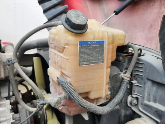 Picture of (Used) 2022 International LT625, RADIATOR OVERFLOW BOTTLE/COOLANT RESERVOIR